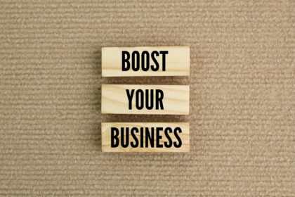 sticks arranged with the words boost your business.