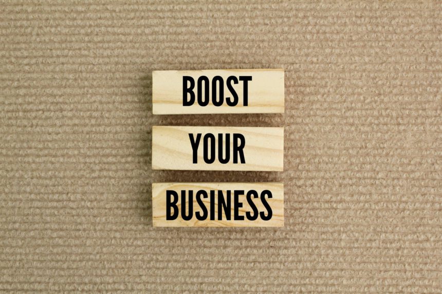 sticks arranged with the words boost your business.