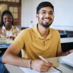 Study, classroom and students with education, learning and knowledge for exam, test and assessment